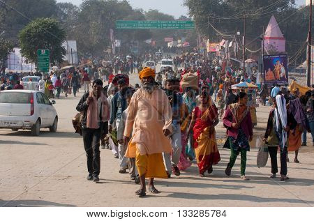 ALLAHABAD, INDIA - JAN 27, 2013: Crowd of the hindu people rush to Sangam during the biggest festival in the world - Kumbh Mela on January 27, 2013 in India. Mela 2013 will take 130 000000 visitors