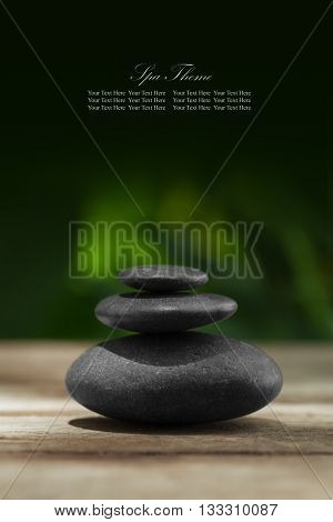close up view of gray stones and leaf on color back. Banner, extra space for your text.