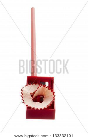 red pencil and red sharpener isolated on a white background