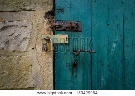 The metal lock on a door .