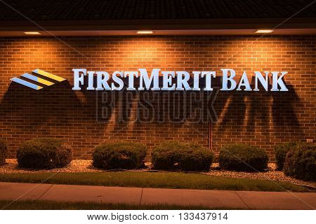 Oshkosh WI - 5 June 2016: Firstmerit bank sign illuminated at night. Bemis