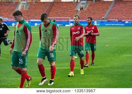 MOSCOW - MAY 11 2016: Lokomotiv team in the warm-up before soccer game Russian Premier League Lokomotiv (Moscow) vs Kuban (Krasnodar) the stadium Lokomotiv Moscow Russia. Lokomotiv lost 0: 1
