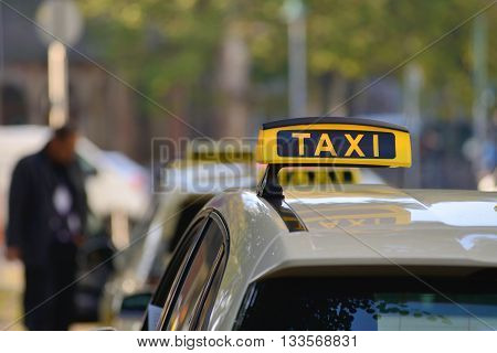 Taxi sign on taxi car in Berlin, Germany