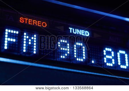 FM tuner radio display. Stereo digital frequency station tuned. Horizontal