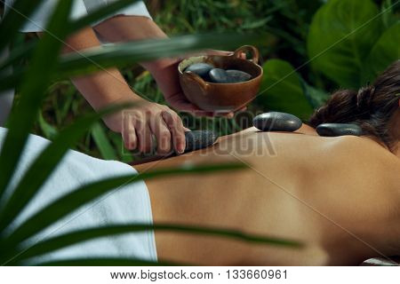 portrait of young beautiful woman in spa environment