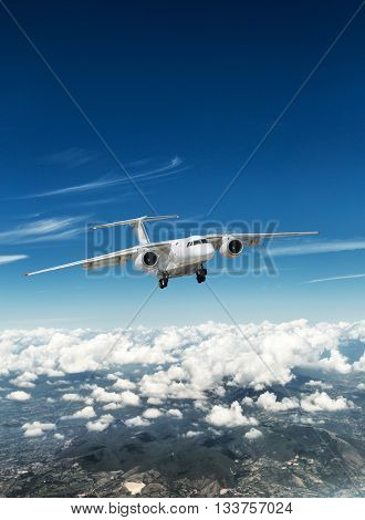 Airplane over the clouds.