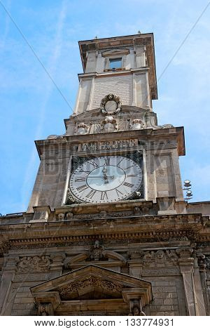 Milan Italiy. Giureconsulti palace decoration. Clock tower. Construction of the palace began in 1562 by the architect Vincenzo Seregni.