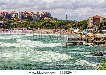 Morning Waves Near The City Beach