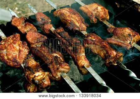 Taste grilled meat skewers. Good o do with family.