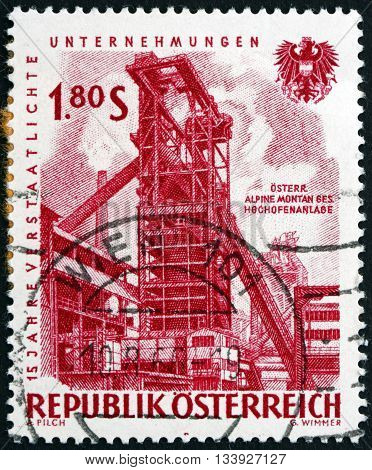 AUSTRIA - CIRCA 1961: a stamp printed in Austria shows Iron Blast Furnace 15th Anniversary of Nationalized Industry circa 1918