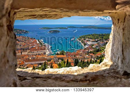 Hvar bay aerial view through stone window from Fortica fortress Dalmatia Croatia