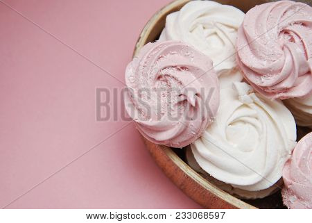 Pink Homemade Marshmallows Or Zephyr. Pink Strawberry Desert Over Pink Background.