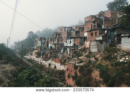 Old Dirty Houses In The Slums Quarter In Haridwar, India. Poverty And Hunger As A Social Problem Of 