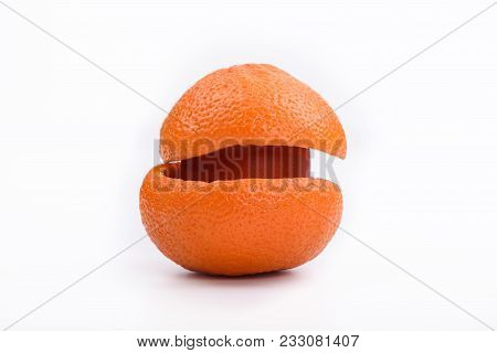 Easter Egg Hidden In Mandarin Crusts Isolated On White Background