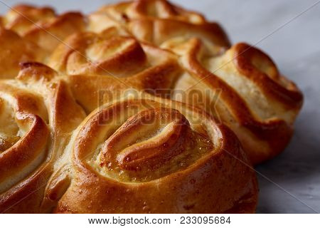 Homemade Rose Bread With Raisins Over White Textured Background, Close-up, Top View, Shallow Depth O