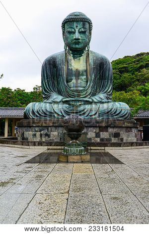 Kamakura, Japan - July 24, 2013: Beautiful And Famous Giant Bronze Buddha Statues Kamakura Daibutsu 