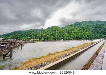 Wide Angle Long Exposure Of Katsura River And Togetsukyo Bridge In Arashiyama, Kyoto, Japan.
