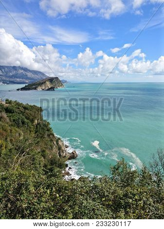 Coastline Of Budva, Montenegro. Adriatic Sea. St.nicholas Island In The Distance