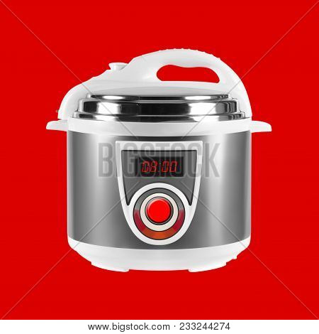 Home Appliance - Multicooker Pressure Cooking Isolated Red Background.
