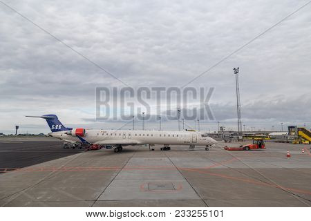 Copenhagen, Denmark - July 22, 2017: A Pushback Truck With An Aircraft At Copenhagen Airport