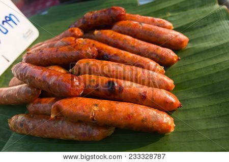 Hot Dogs Or Sai Aua ((notrhern Thai Spicy Sausage) On Banana Leaf