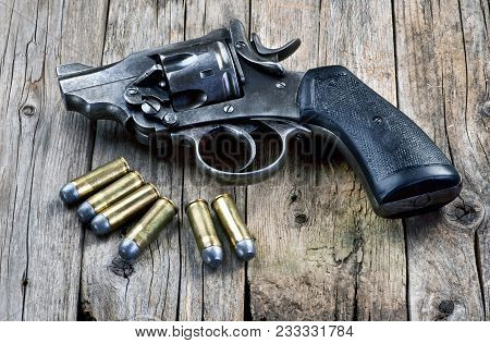 Old Snub Nose 45 Pistol With Six Bullets.