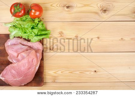Freshvegetables And Dietary Meat On Wooden Background. Healthy Natural Food On Table With Copy Space