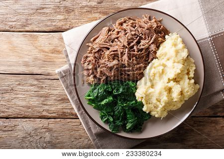 Botswana Cuisine: Seswaa Beef Stew With Pap Porridge And Spinach Close-up On A Plate. Horizontal Top