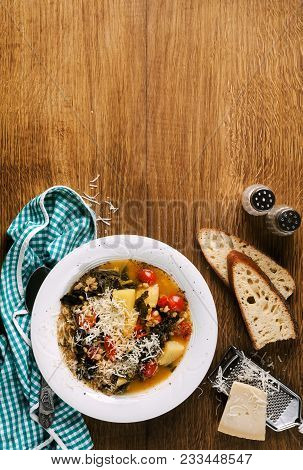 Curly Kale Or Cavolo Nero And Barley Soup. Winter Vegetable So
