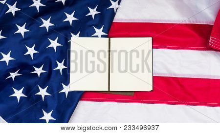 Red Blue Flag Of Unired States Of America With Note On It.