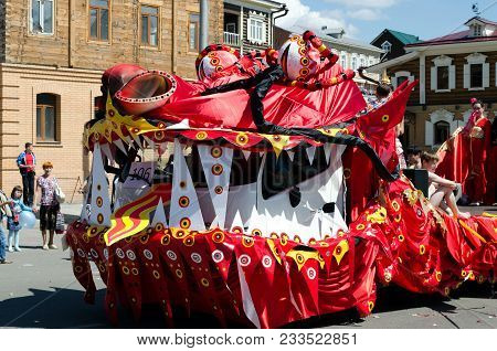 Irkutsk, Russia - June,01 2013: Big Car Decorated As Chinese Rred Dragon On City Day Parade. Irkutsk