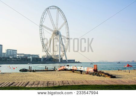 Dubai, United Arab Emirates - March 8, 2018: Jbr, Jumeira Beach Resort Beach With Ain Dubai Ferris W