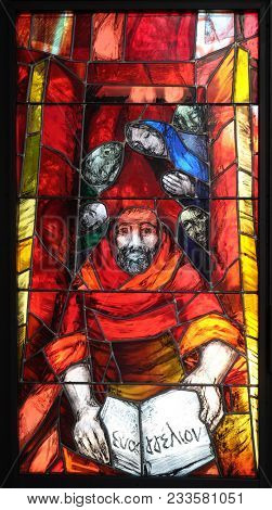 LEUTERSHAUSEN, GERMANY - JULY 05: Pentecost, stained glass window by Sieger Koeder in church of Saint Bartholomew in Leutershausen, Germany on July 05, 2017.