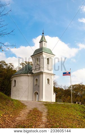 National Cultural Monument Rotunda Of St. George With The Flag Of The Slovak Republic Waving On The 