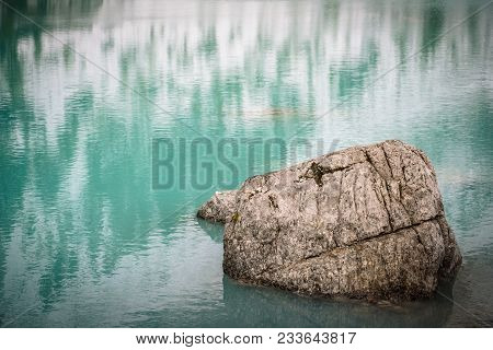 The Mountain Lake Lago Di Sorapiss In Dolomite Alps. Italy, With Amazing Turquoise Color Of Water.