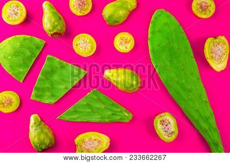 Creative Layout Made Of Mexican Cactus Leaves And Cactus Fruits Pricly Pear Or Tuna On Red Backgroun