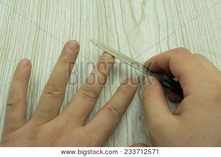 Nail Clipping And Man Manicure In Beauty Salon