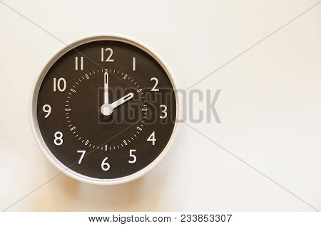 The Time For Wall Clock Of The Room Is 2:00