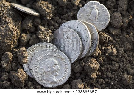 Roman Silver Coins Covered In Dirt