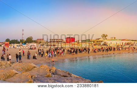 Costinesti, Romania - July 20, 2017: Young People On The Beach Waiting The Sunrise In The Morning, I