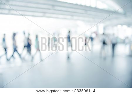 White Blurred Of People Walking In City Town. Defocused Blur Background.