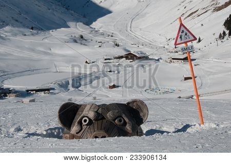 Buried Wooden Bear In An Austrian Ski Resort