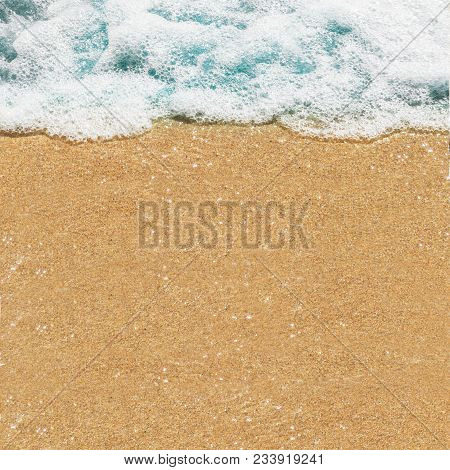 Background Image Of Beach Golden Sand And Blue Foam Wave