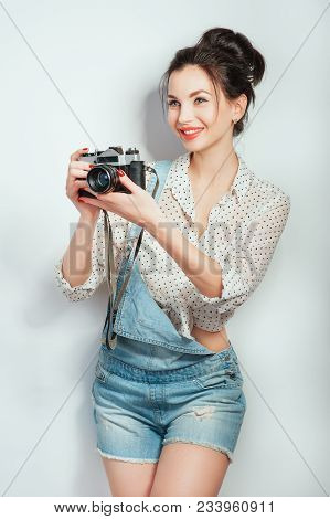 Fashion Look, Pretty Cool Young Woman Model With Film Camera Wearing In Denim Clothes Posing On Whit
