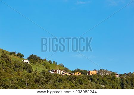 House On A Hill In The Mountains Of Italy.
