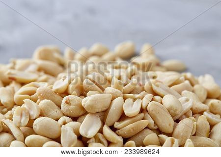 Pile Of Peelled Peanuts Isolated On White Textured Background, Background, Top View, Close-up, Selec