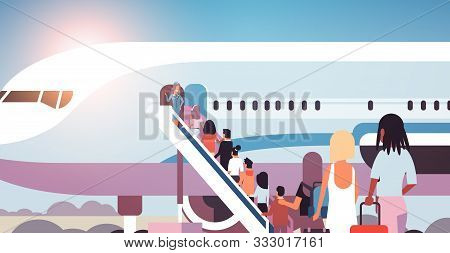 Queue Of People Travelers With Luggage Going To Plane Mix Race Rear View Passengers Climb The Ladder