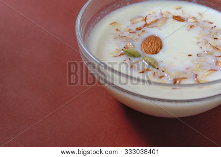 Almond And Cardamom Design With Sweet Dish In Bowl