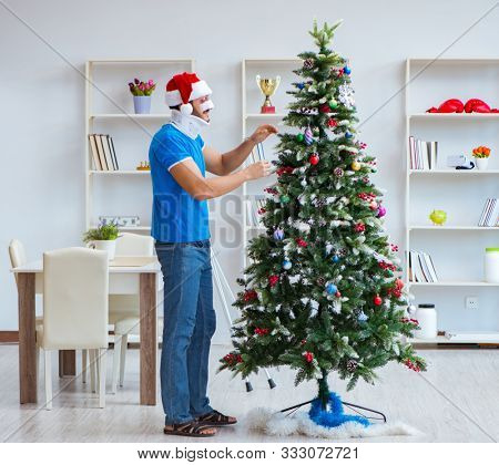 Injured man celebrating christmas at home