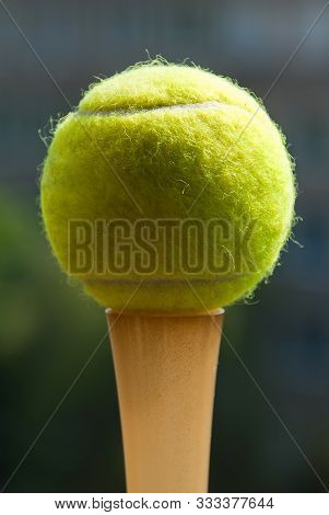 Tennis Ball On Darck Background. Close Up